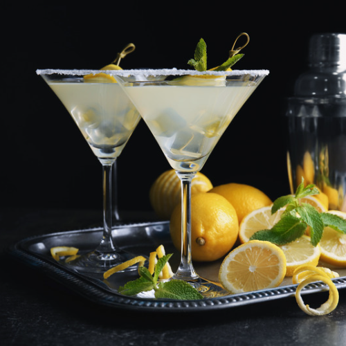 Two Lemon Drop Martinis on a Silver Tray with Lemon Garnishes
